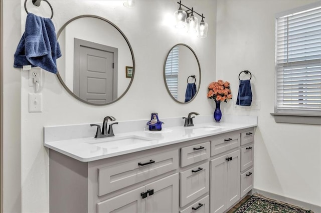 1305 Katelyn Ct, Yukon, OK 73099 - bathroom featuring double vanity