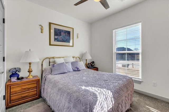 1305 Katelyn Ct, Yukon, OK 73099 - bedroom with carpet floors and ceiling fan