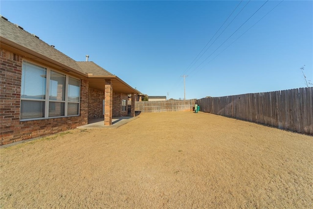 view of yard with a patio area