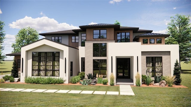 back of property with french doors and a yard