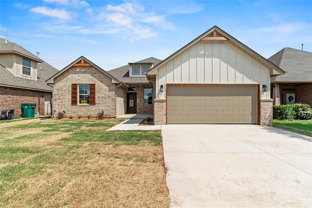 view of front of home featuring a garage and a front lawn