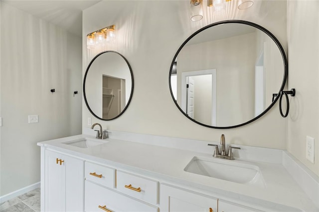 bathroom featuring tile patterned floors and vanity