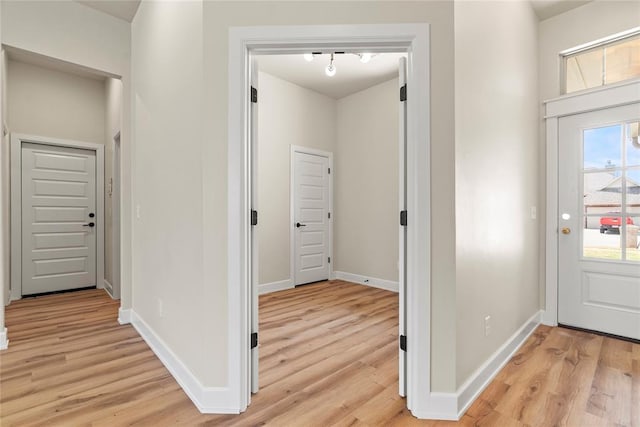 foyer entrance featuring light hardwood / wood-style flooring