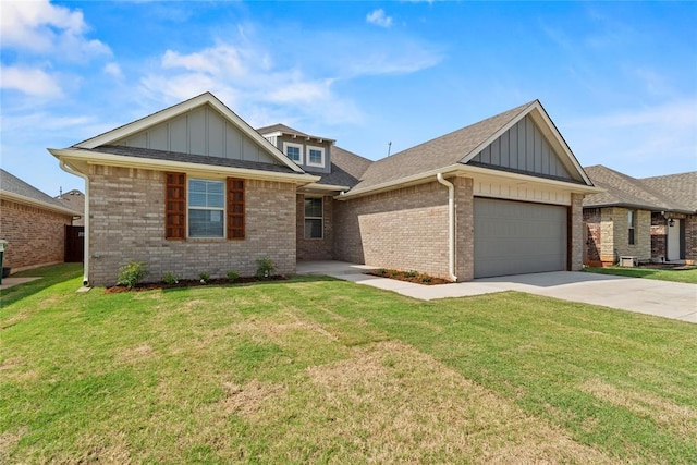 view of front of property with a garage and a front lawn