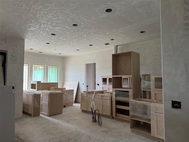 kitchen featuring light brown cabinets