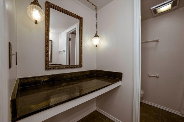 bathroom featuring tile patterned floors and toilet