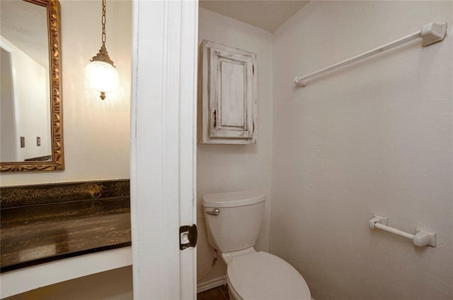 bathroom featuring toilet