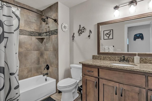 full bathroom with tile patterned flooring, shower / tub combo, vanity, and toilet