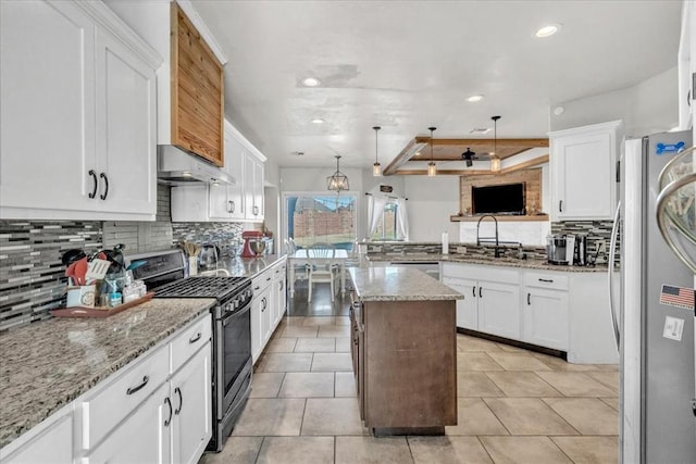 kitchen featuring range hood, stainless steel appliances, white cabinets, a sink, and a peninsula