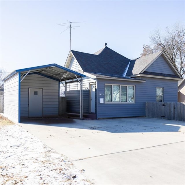 view of front of property with a carport