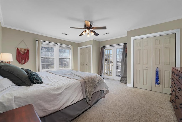 bedroom featuring multiple windows, ceiling fan, access to exterior, and light carpet