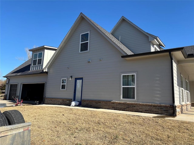 view of side of home with a garage