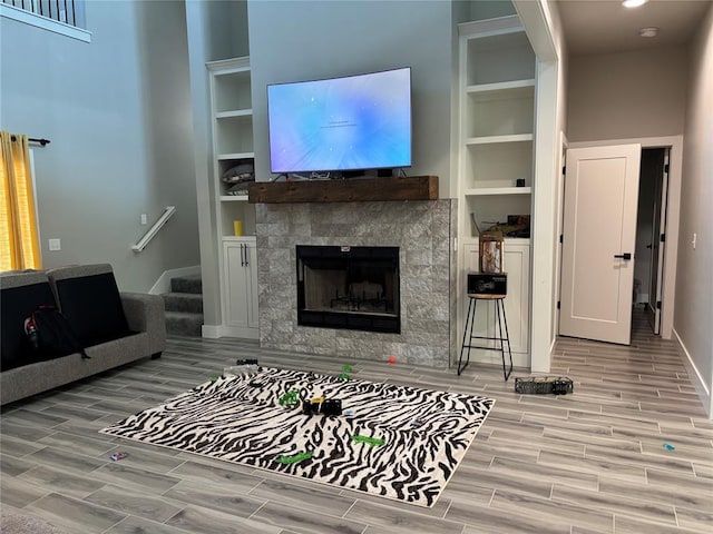 living room featuring built in shelves