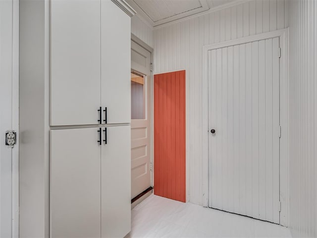 bedroom with wooden walls