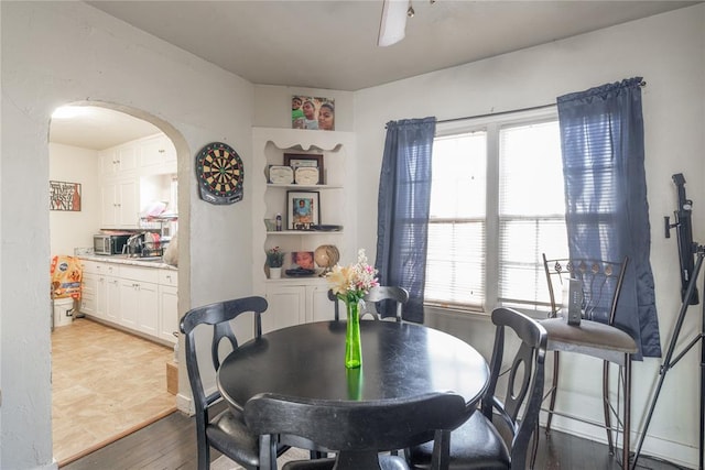 dining space with light wood-type flooring