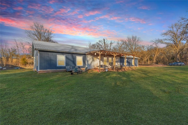 view of front of property with a lawn