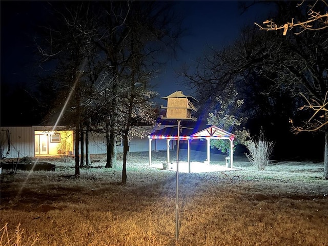 playground at night with a gazebo