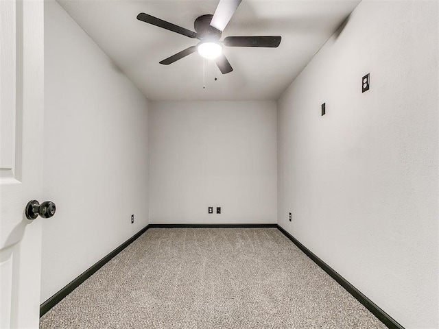 unfurnished room with light colored carpet and ceiling fan