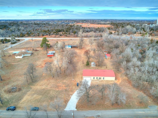 birds eye view of property with a rural view