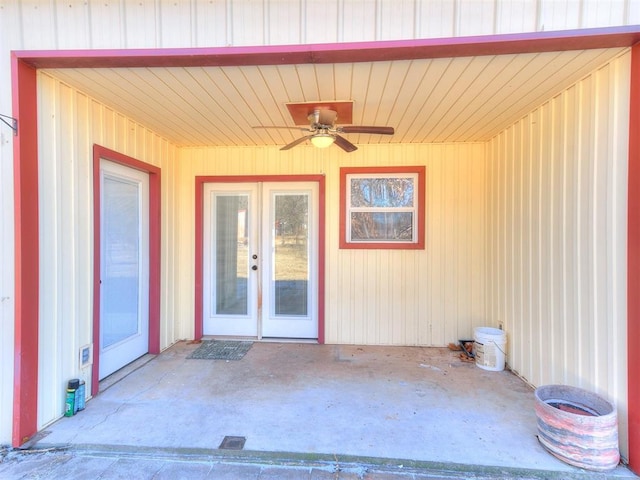 entrance to property with french doors, ceiling fan, and a patio area