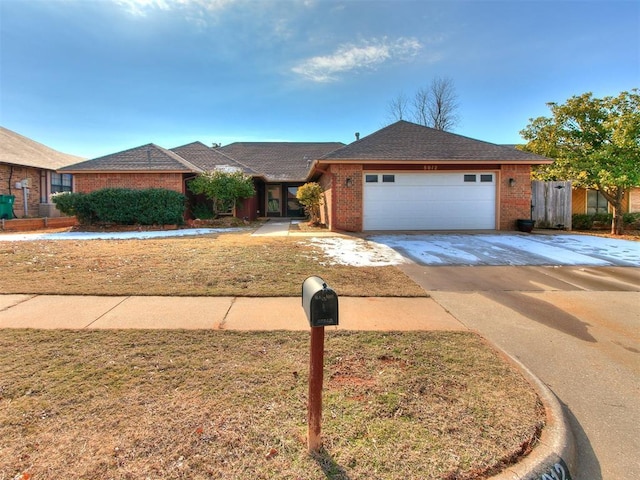 single story home with a garage