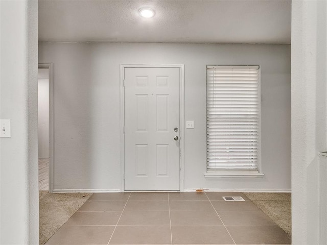 view of tiled foyer