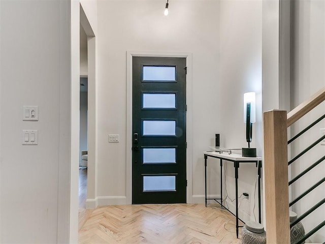 entrance foyer with light parquet floors