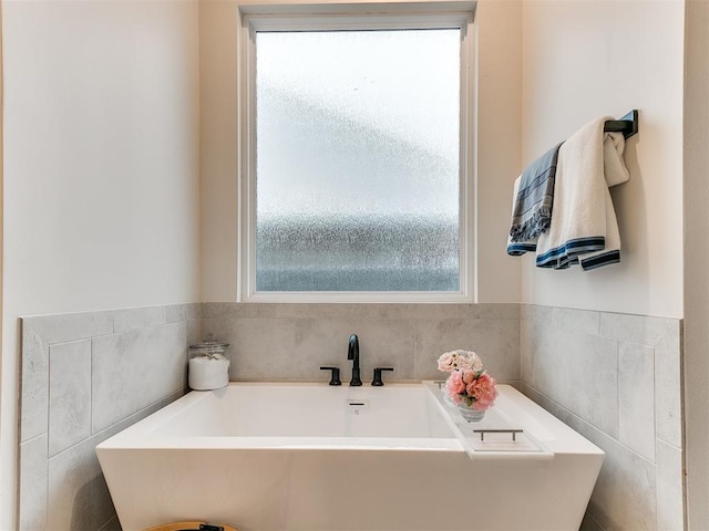 bathroom with a tub