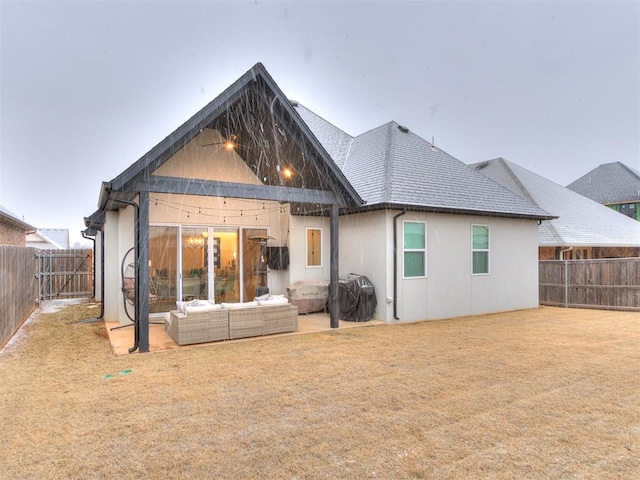 rear view of house with a patio and an outdoor hangout area