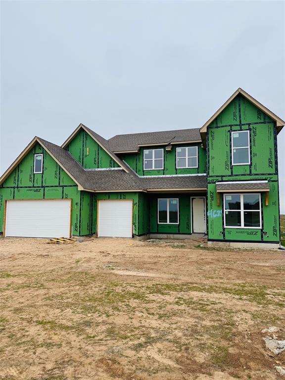 property under construction with a garage