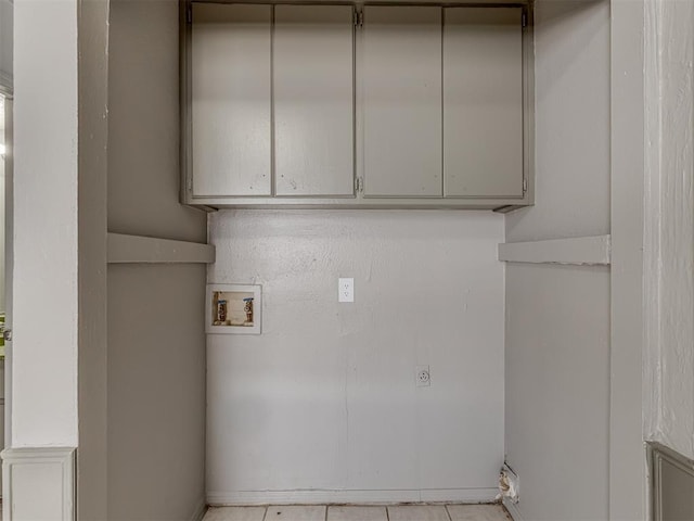 laundry area with light tile patterned floors, washer hookup, and hookup for an electric dryer