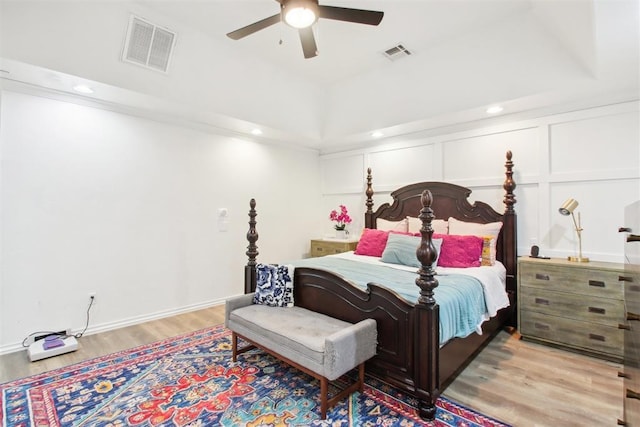 bedroom featuring ceiling fan and light hardwood / wood-style flooring