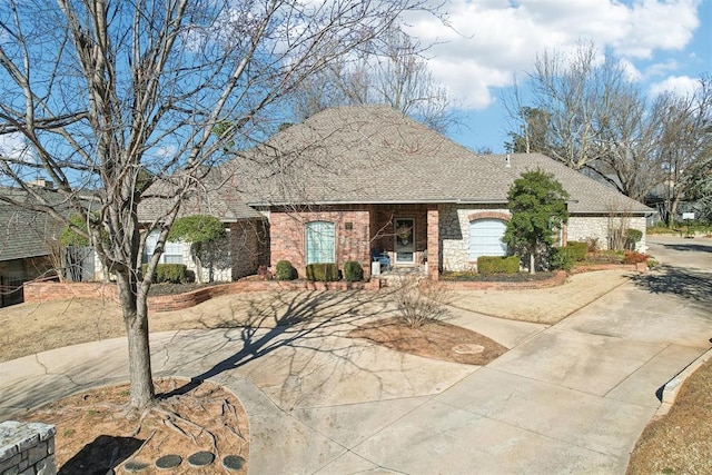 ranch-style house featuring a garage