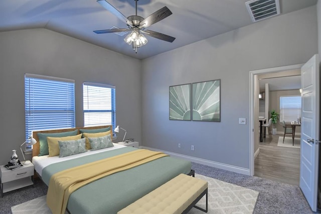 bedroom featuring carpet flooring, ceiling fan, and lofted ceiling