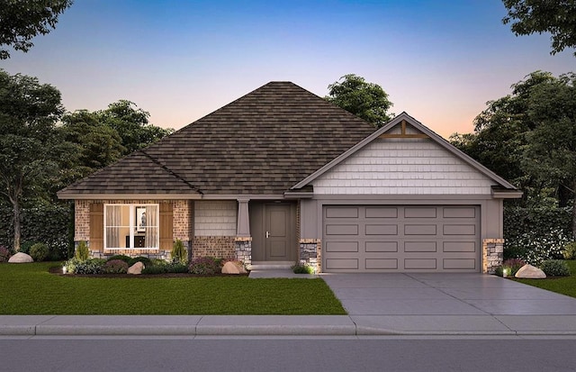 view of front of house with a garage, concrete driveway, brick siding, and a front lawn