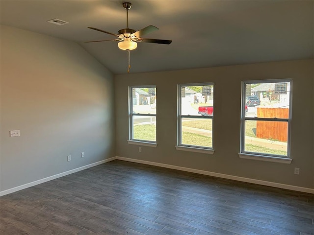 unfurnished room with ceiling fan, dark hardwood / wood-style flooring, and lofted ceiling