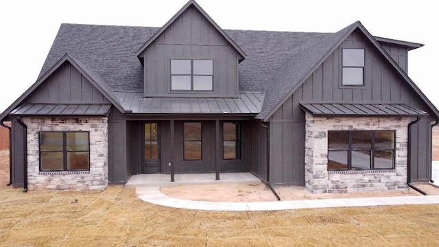 modern inspired farmhouse with a fireplace