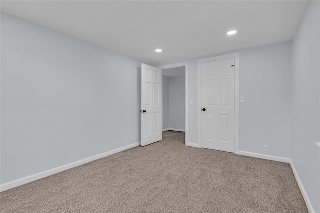 unfurnished bedroom with a closet and carpet