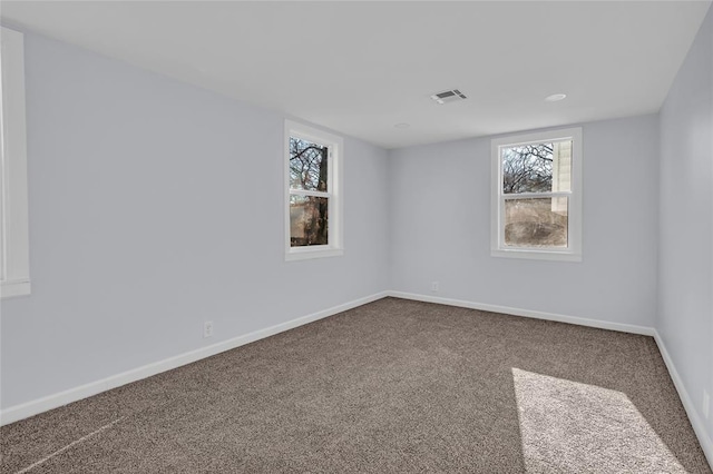 view of carpeted spare room