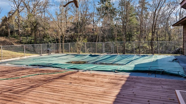 view of pool featuring a wooden deck