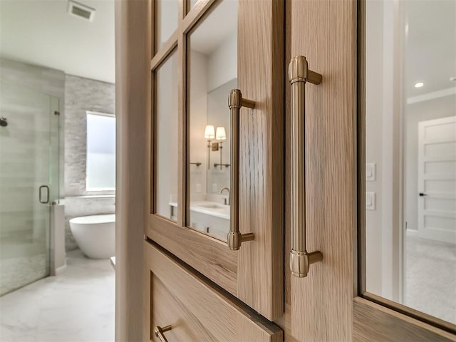 2408 Lazio Way, Edmond, OK 73034 - bathroom featuring vanity, a soaking tub, and a stall shower