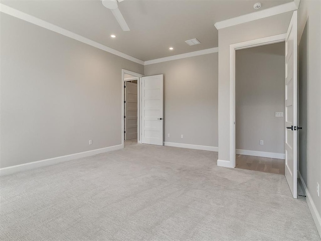 2408 Lazio Way, Edmond, OK 73034 - unfurnished bedroom featuring crown molding, light carpet, recessed lighting, and ceiling fan