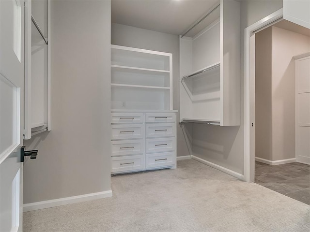 2408 Lazio Way, Edmond, OK 73034 - spacious closet featuring light colored carpet