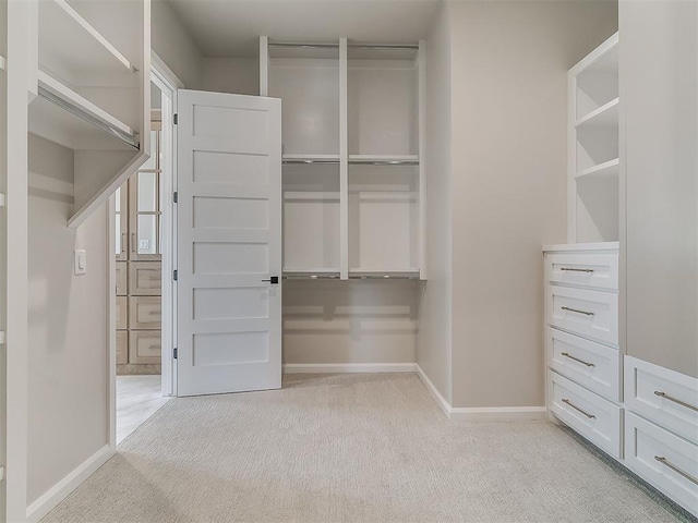 2408 Lazio Way, Edmond, OK 73034 - walk in closet with light carpet