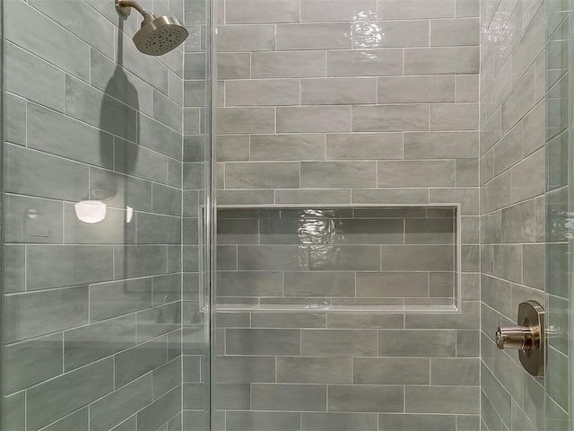 2408 Lazio Way, Edmond, OK 73034 - bathroom featuring a tile shower