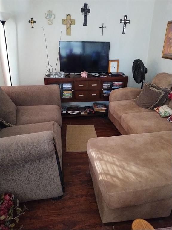 living room featuring dark wood finished floors