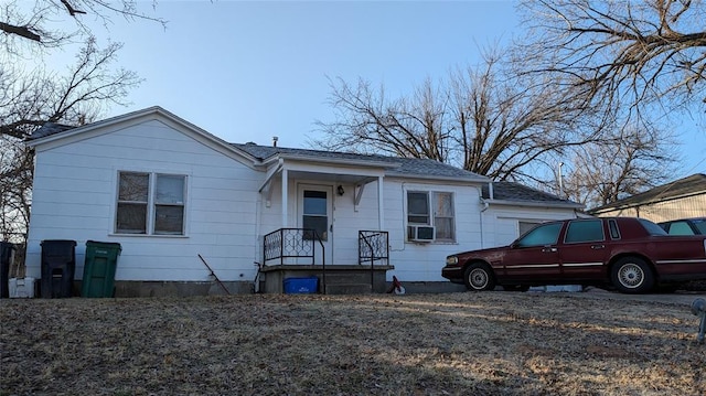 view of front of home featuring cooling unit