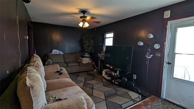 living room with a ceiling fan