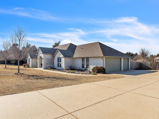 single story home featuring a garage