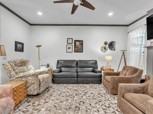 living room with ceiling fan and crown molding